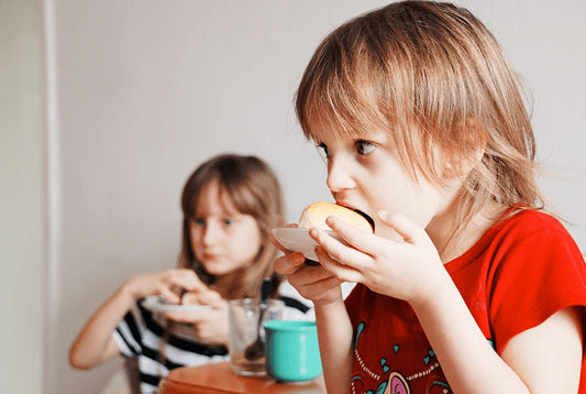 Child eating a piece of bread