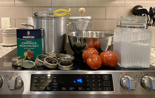 Canning supplies on a stove