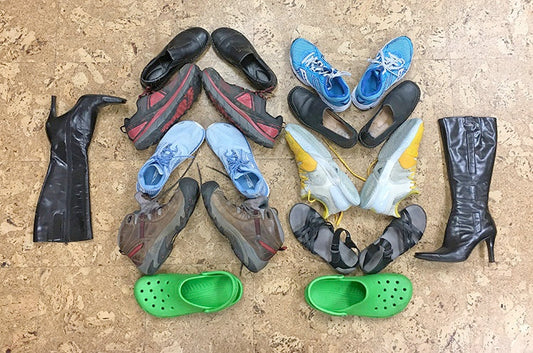 A collection of gently worn shoes and boots for donation