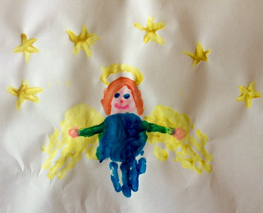a portion of a quilt with an angel
