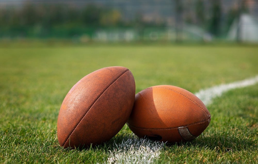 Footballs on a yard line