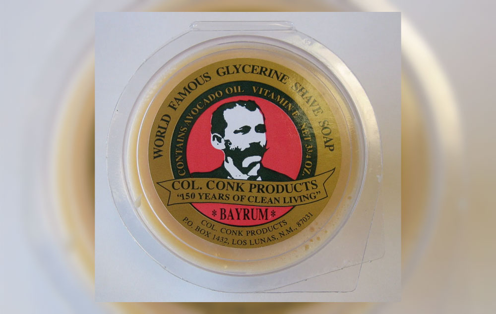 A cake of Colonel Conk shaving soap