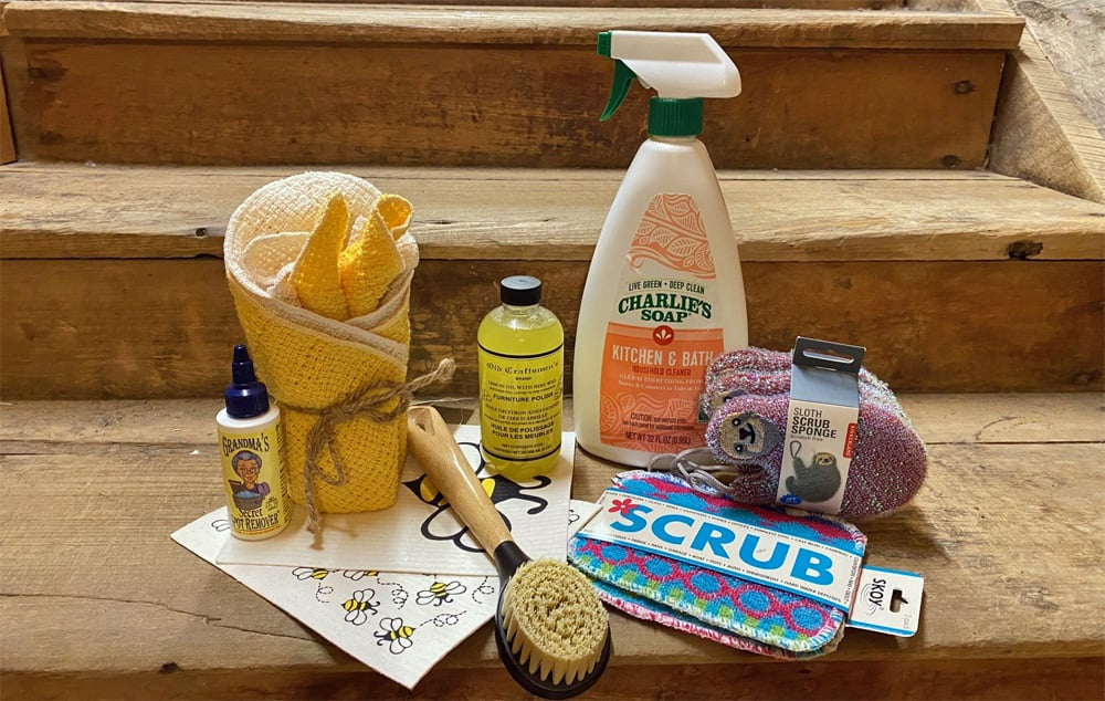 A robust collection of cleaning supplies on stairs