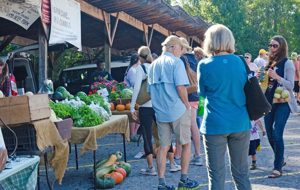 Prople shopping at a Fall Farmer's Market