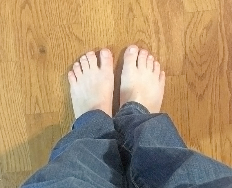 Bare feet on a wood floor