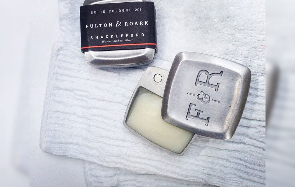Fulton & Roark hard cologne products on a towel