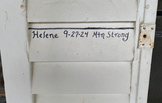 The high water mark on the front door of the Mast Store Annex in Valle Crucis shows the date of Helene's highest water.