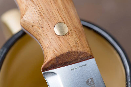 The hilt and part of the blade of a Helle Knife