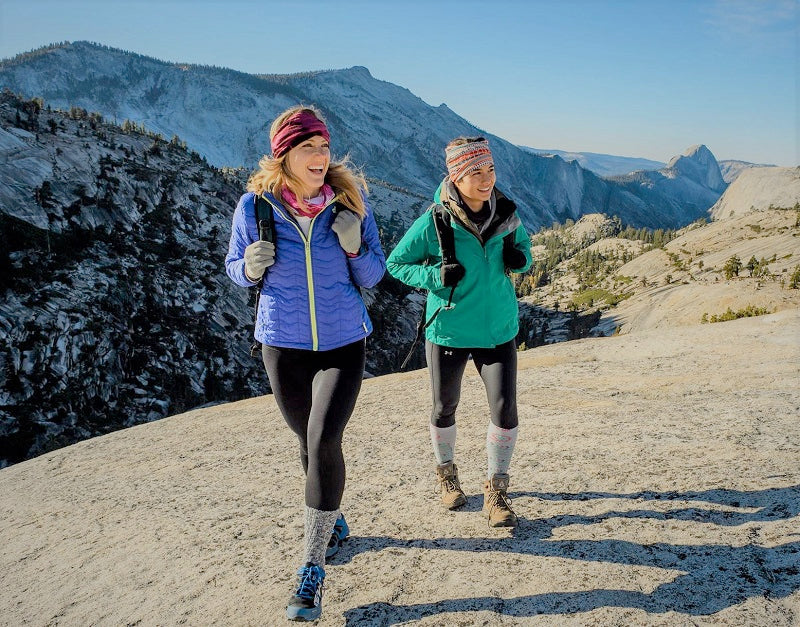 Women hiking on a mountaintop