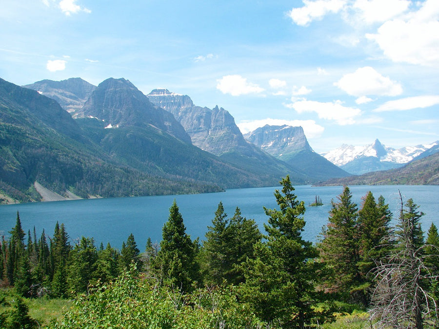 Long rance vmountain view with a lake and mountains at Glacier National Park