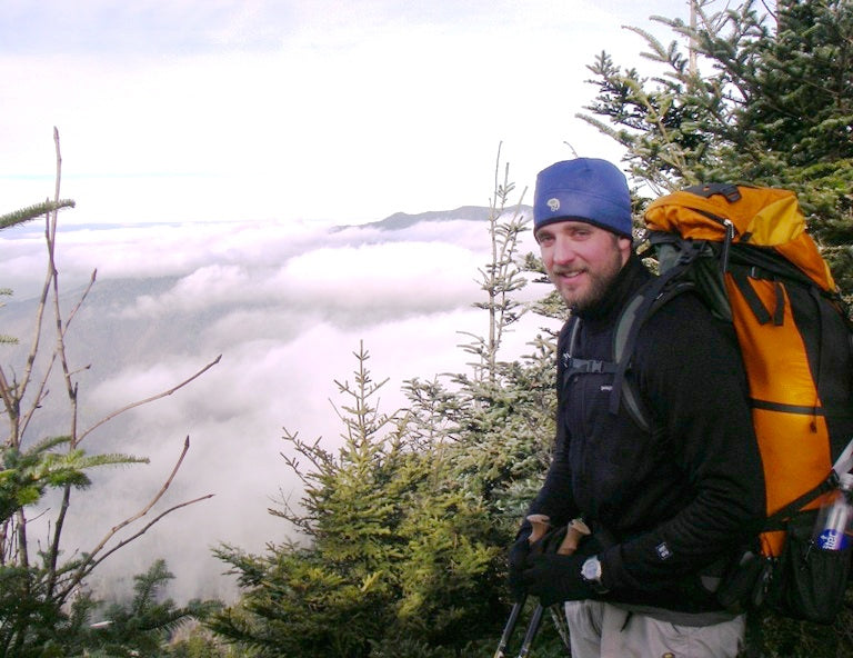 Chris Hiking the Smokies overlooking a cloud filled valley