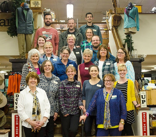 Mast Store Waynesville Staff on the stairs in the store