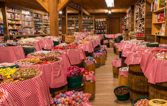 Mast Store Candy Barrel featuring more than a dozen barrels of candy.