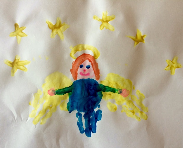 a portion of a quilt with an angel