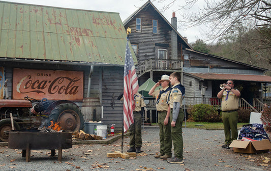 Members of Scout Troop 109 help retire United States flags