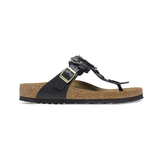 Black floral thong sandals with a cork footbed and adjustable strap, ideal for summer comfort and style.