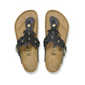 Stylish black sandals with floral embellishments and a comfortable footbed, perfect for casual summer wear.