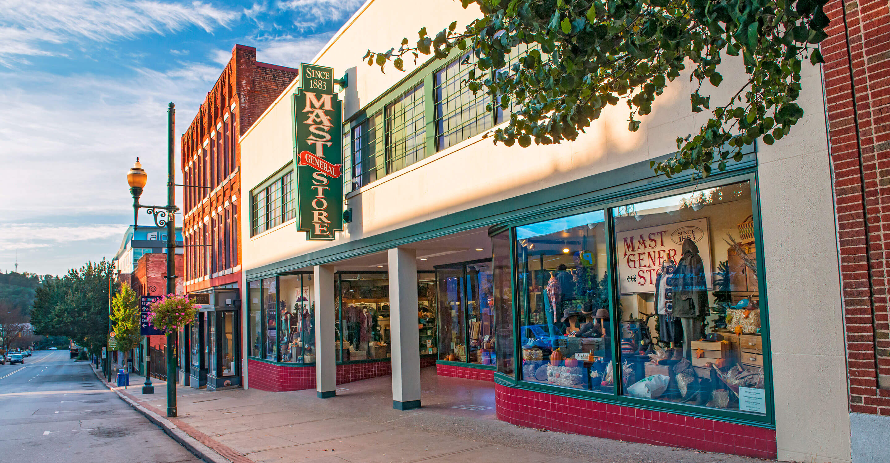 Street view of the Mast General Store in Asheville, NC on a sunny morning